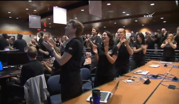 The New Horizons team at Johns Hopkins APL when the image above was revealed. (NASA TV)